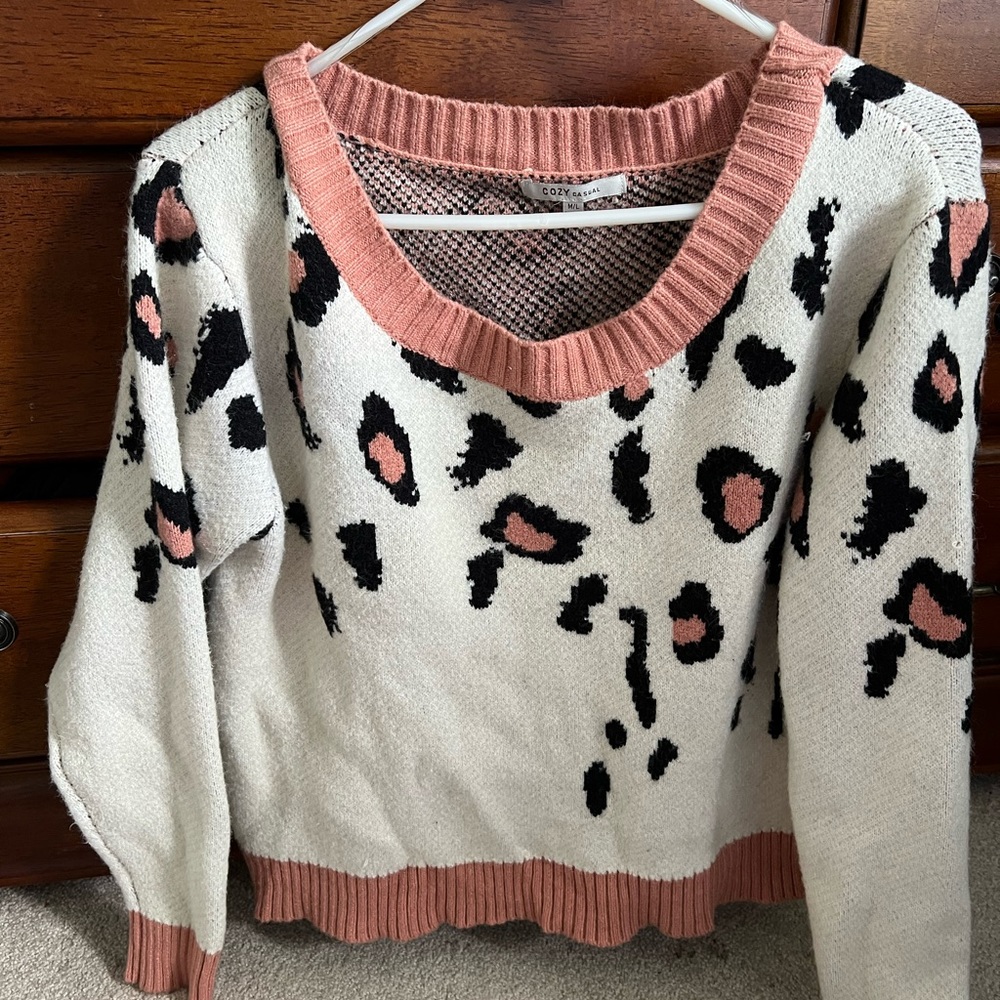 Pink, black and cream sweater